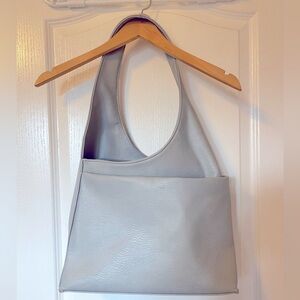 S Q light blue purse.